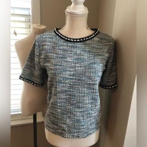 Zara women’s top. Has a thin sweater feel to it. Never worn. No tags though